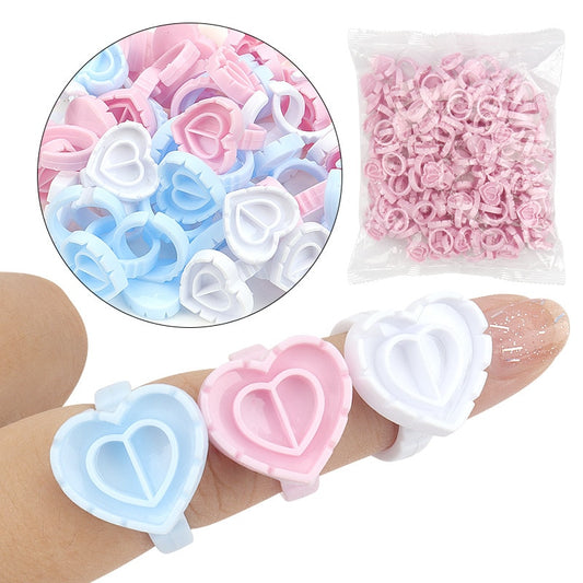 100 PCS Disposable Heart-shaped Plastic Glue Ring Cup Eyelash Extension Tattoo Pigment Holder Pallet Lash Makeup Supplies Tools